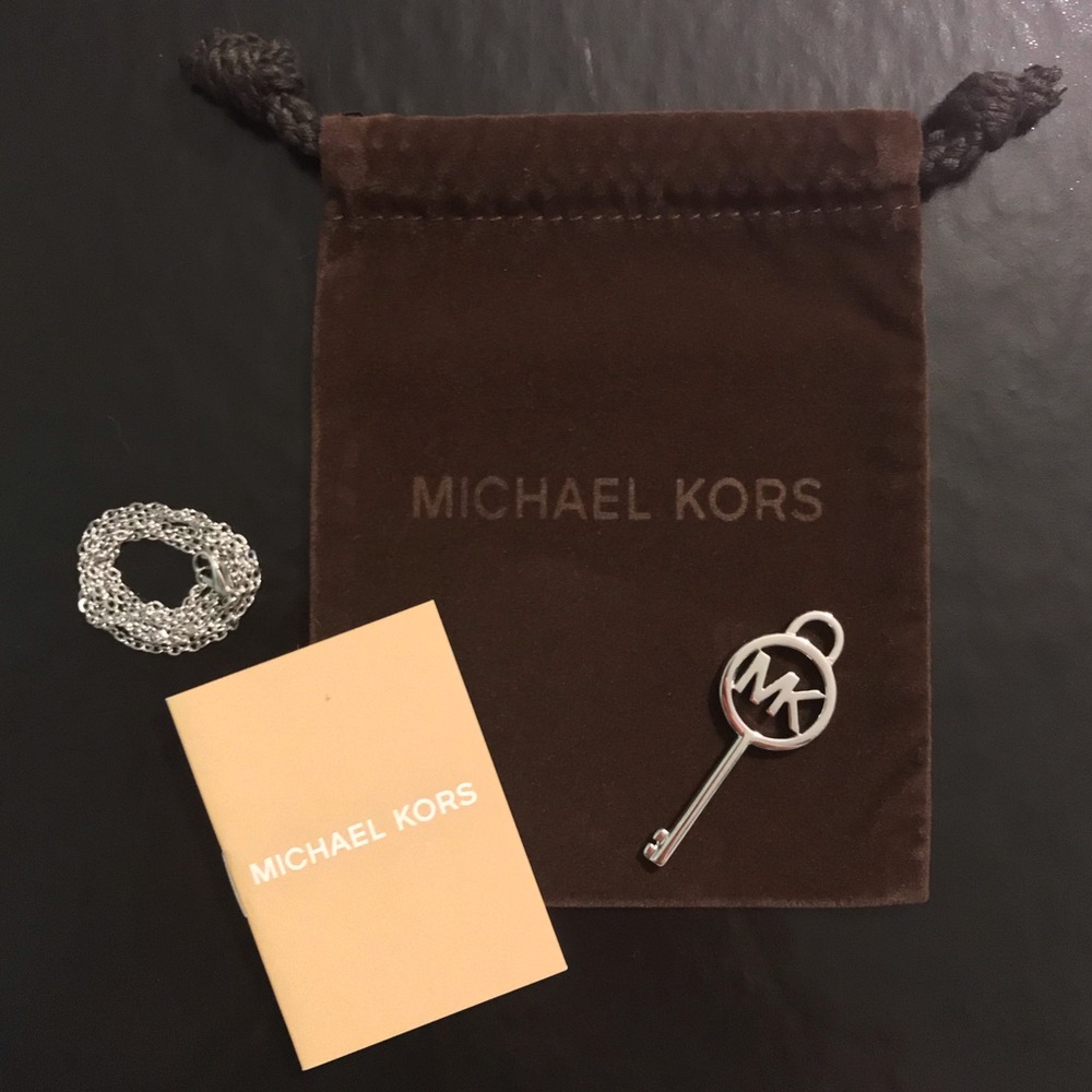 Authentic Michael Kors key charm NEW